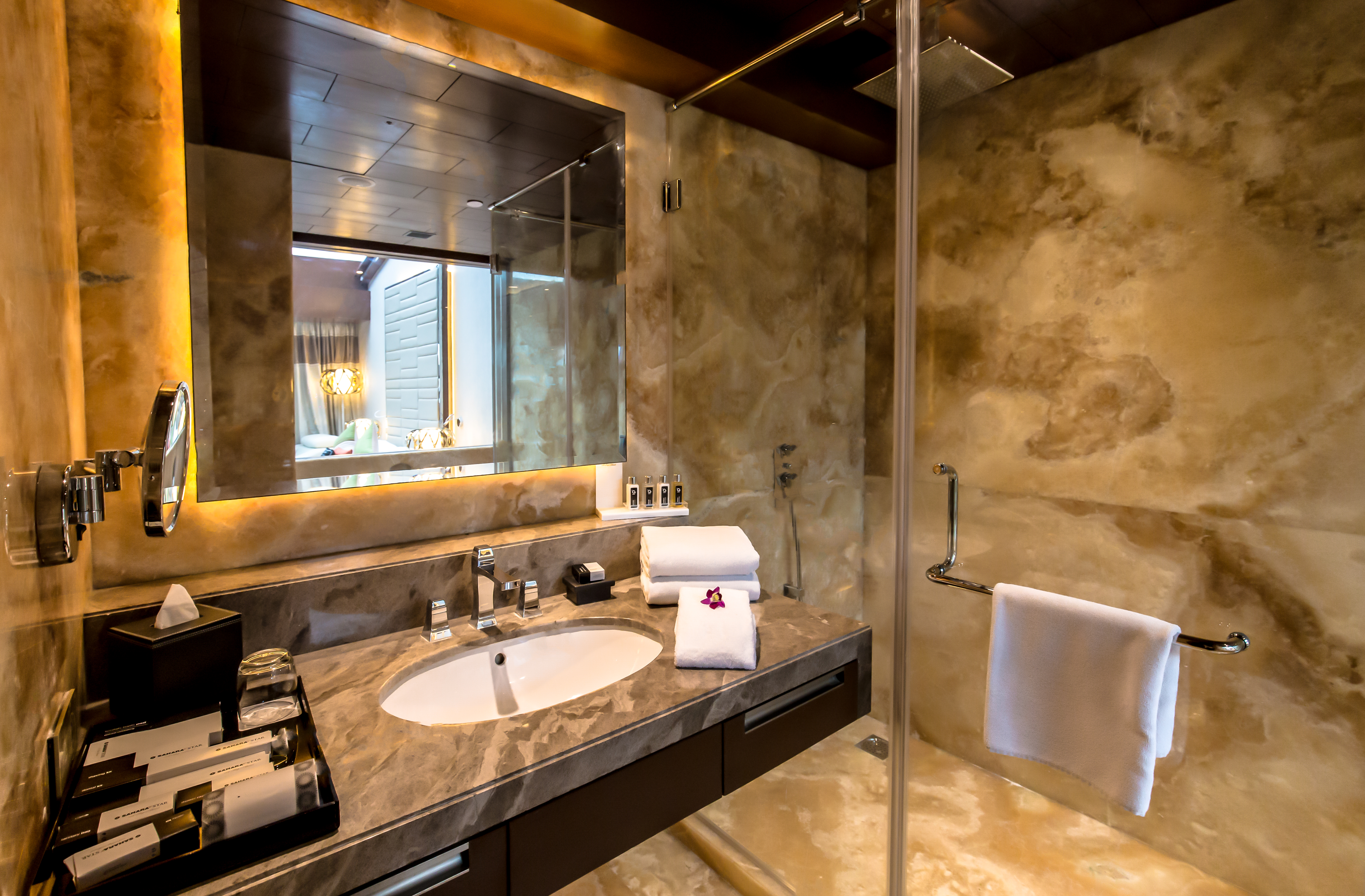 Venus Premier Room at Sahara Star
              hotel near Mumbai airport, featuring king-sized bed,
              spacious balcony, and city views